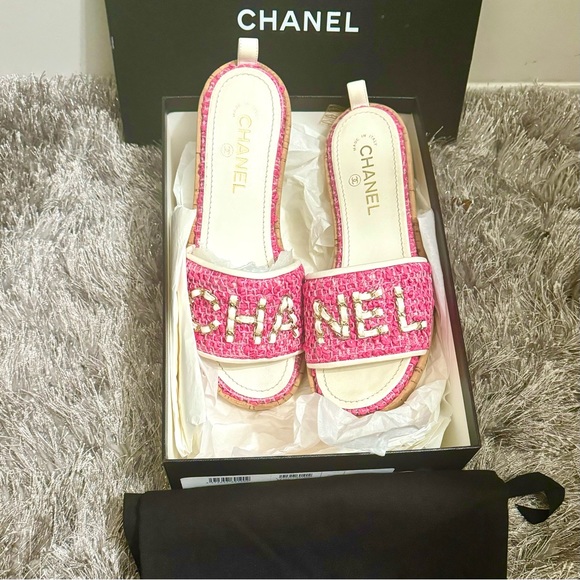 CHANEL Shoes - CHANEL Pink Woven Logo Slide Sandals